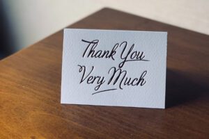Notecard with "thank you very much" written on it.